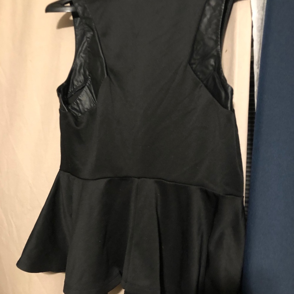 Used beautiful peplum shirt